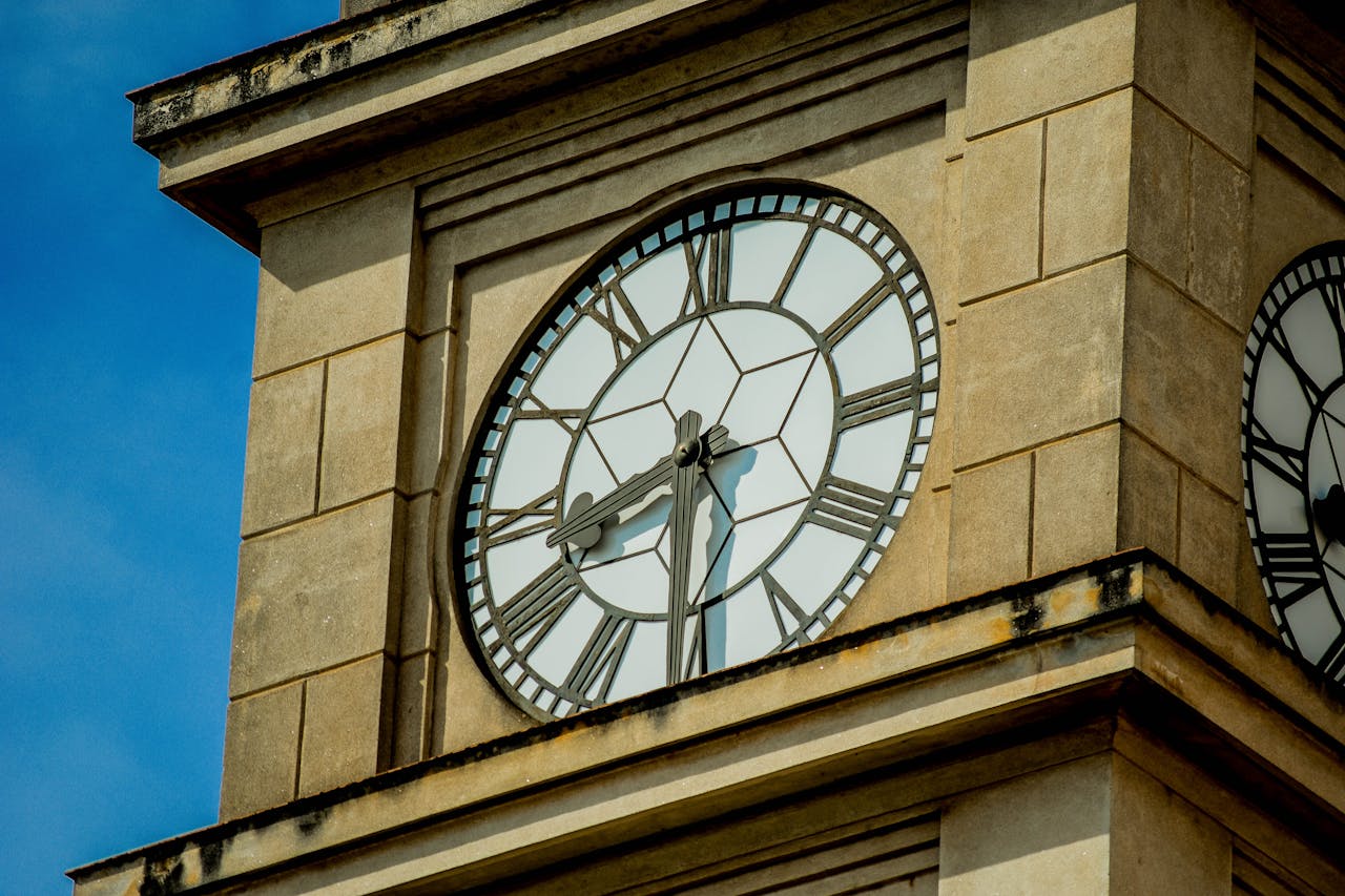 Detailed view of a clock tower in Piracicaba, Brazil, capturing architectural design.